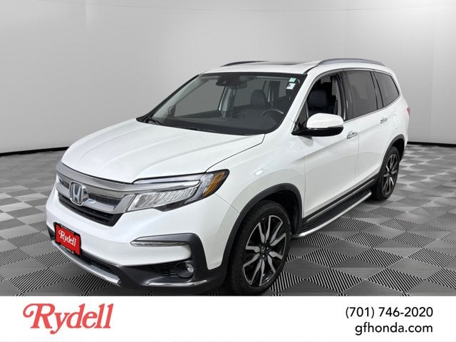 2020 Honda Pilot Touring 7-Passenger in Platinum White Pearl — front three-quarter view