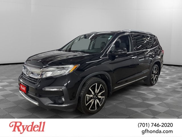 2019 Honda Pilot Touring 8-Passenger in Crystal Black Pearl — front three-quarter view