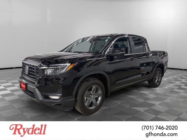 2023 Honda Ridgeline RTL in Crystal Black Pearl — front three-quarter view