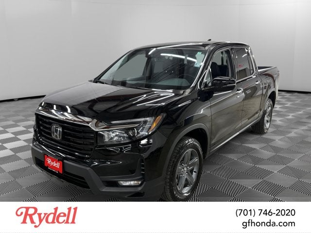 2023 Honda Ridgeline RTL-E in Crystal Black Pearl — front three-quarter view