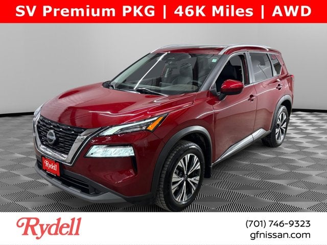 2023 Nissan Rogue SV in Scarlet Ember Tintcoat — front three-quarter view