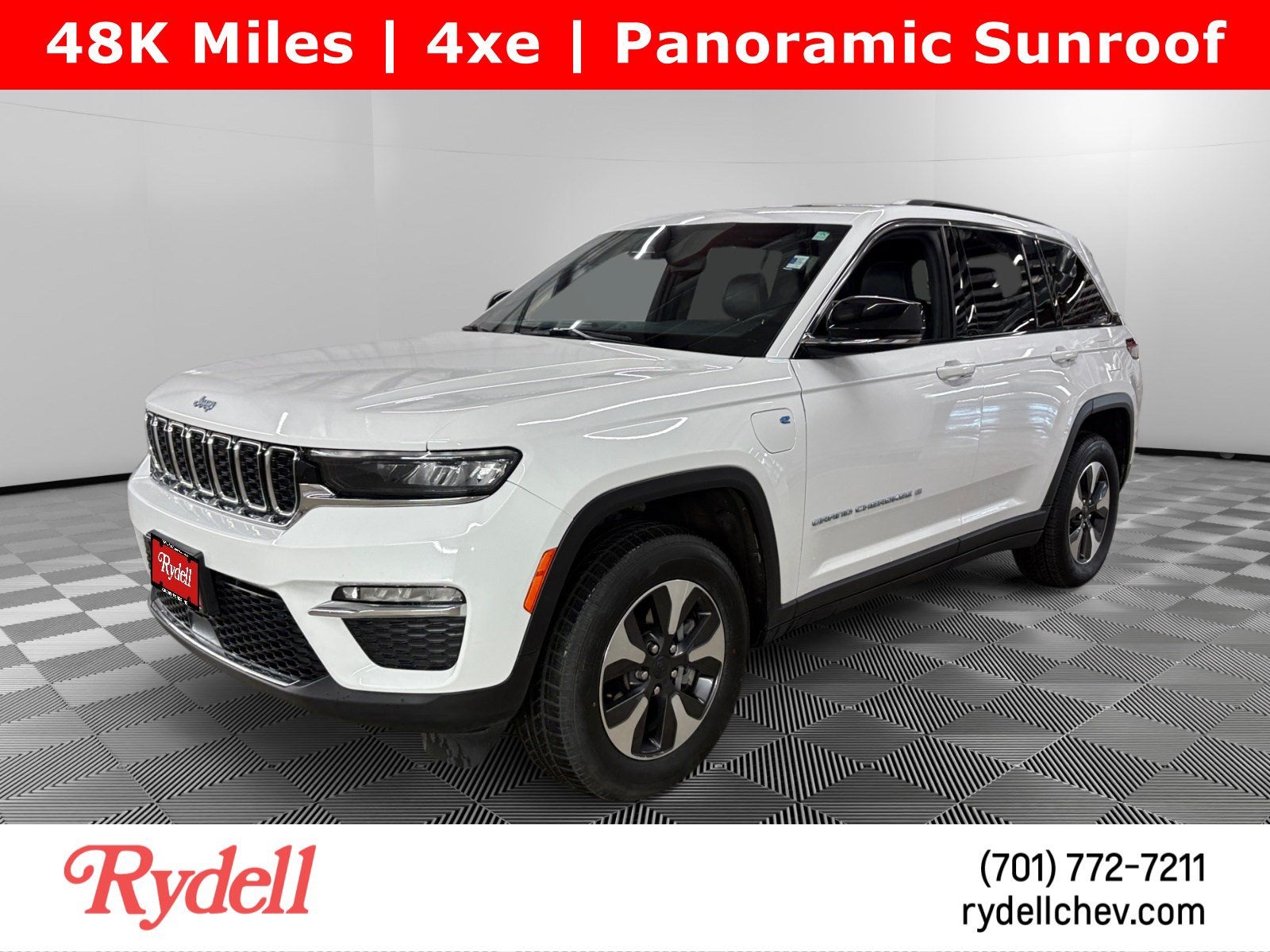 2024 Jeep Grand Cherokee 4xe BLACK in White — front three-quarter view