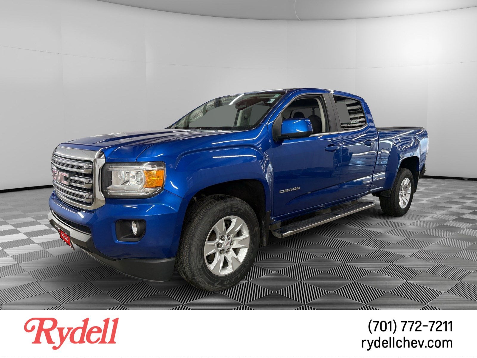 2018 GMC Canyon 4WD SLE in Blue — front three-quarter view