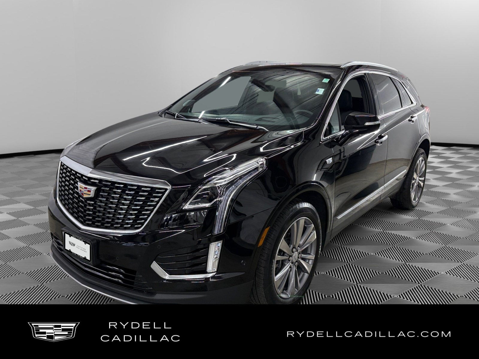 2025 Cadillac XT5 Premium Luxury in Stellar Black Metallic — front three-quarter view