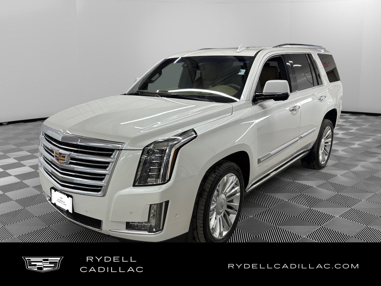 2018 Cadillac Escalade Platinum in Crystal White Tricoat — front three-quarter view